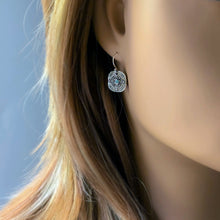 Load image into Gallery viewer, Silver earrings with a blue gemstone on a mannequin