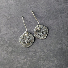Load image into Gallery viewer, Pair of silver earrings with intricate designs on a gray background