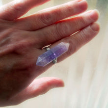 Load image into Gallery viewer, Amethyst crystal ring on a finger for scale
