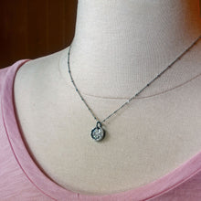 Load image into Gallery viewer, A silver flower pendant necklace with a vintage design, featuring a morning glory flower motif, displayed on a mannequin neck for scale