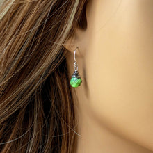 Load image into Gallery viewer, Close-up of a person wearing a green gemstone earring