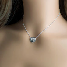 Load image into Gallery viewer, Silver necklace with a thistle pendant shown on a mannequin