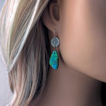 Load image into Gallery viewer, Close-up of a person wearing a blue and green earring with a blurred background