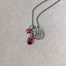 Load image into Gallery viewer, Back of silver charm: necklace with pink tourmaline teardrop pendant and silver charm on a gray background