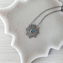 Load image into Gallery viewer, Decorative necklace with a blue gemstone on a white surface