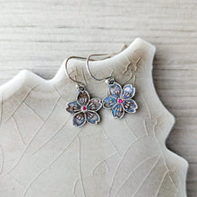 Load image into Gallery viewer, Floral earrings with gemstones on a textured neutral surface