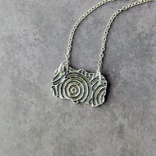 Load image into Gallery viewer, Silver necklace shown reversed on a gray background