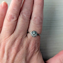 Load image into Gallery viewer, Silver ring with intricate thistle design on a finger against a neutral background
