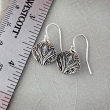 Load image into Gallery viewer, Silver earrings with intricate designs on a gray surface next to a ruler.