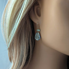 Load image into Gallery viewer, Teardrop-shaped earring worn by a person with blonde hair.

