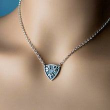 Load image into Gallery viewer, Silver necklace with a detailed pendant on a mannequin
