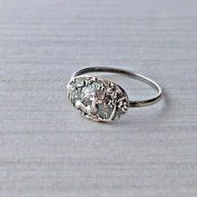 Load image into Gallery viewer, Silver ring with textured design on a gray background
